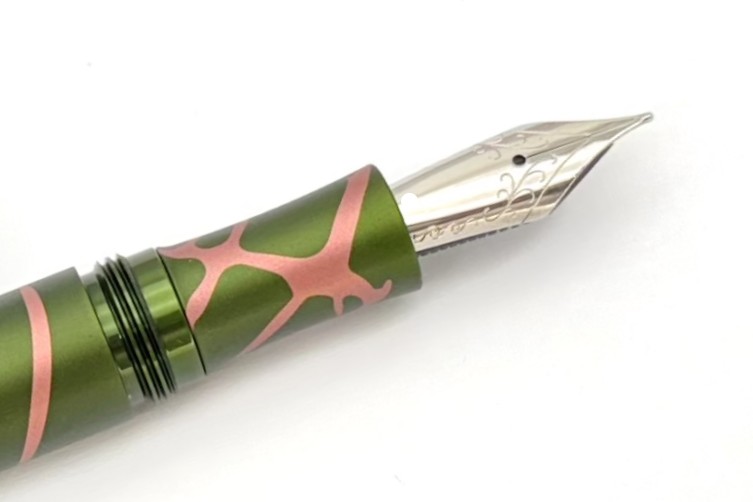 SchonDSGNAnodizedAluminumFullSizedGreenSalmonSplashFP_H